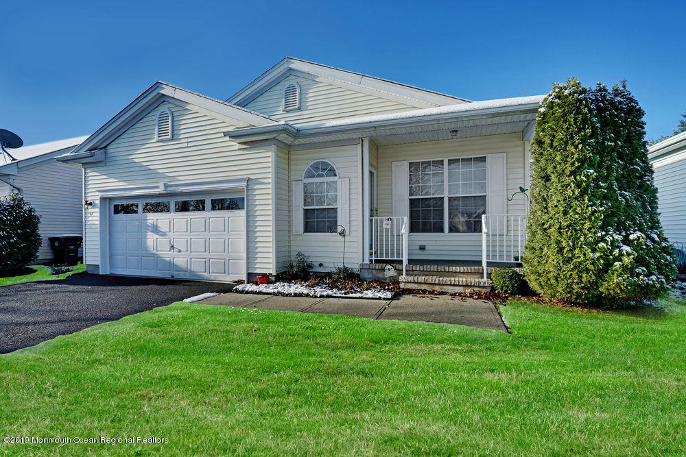 47 Wordsworth Road Brick, NJ 08724 - Photo 1 of 42 a front view of a house with a yard and trees