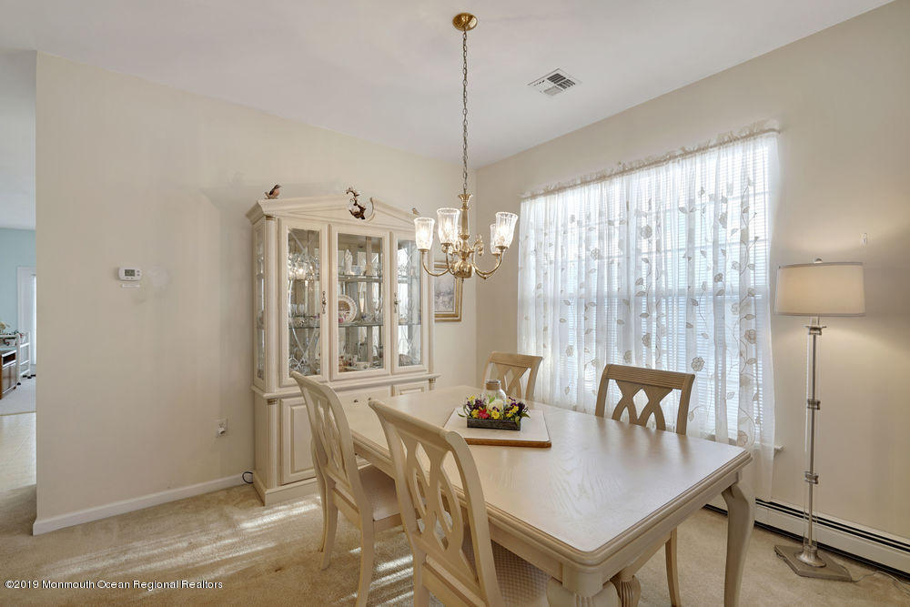 47 Wordsworth Road Brick, NJ 08724 - Photo 12 of 42 a view of a dining room with furniture window and outside view