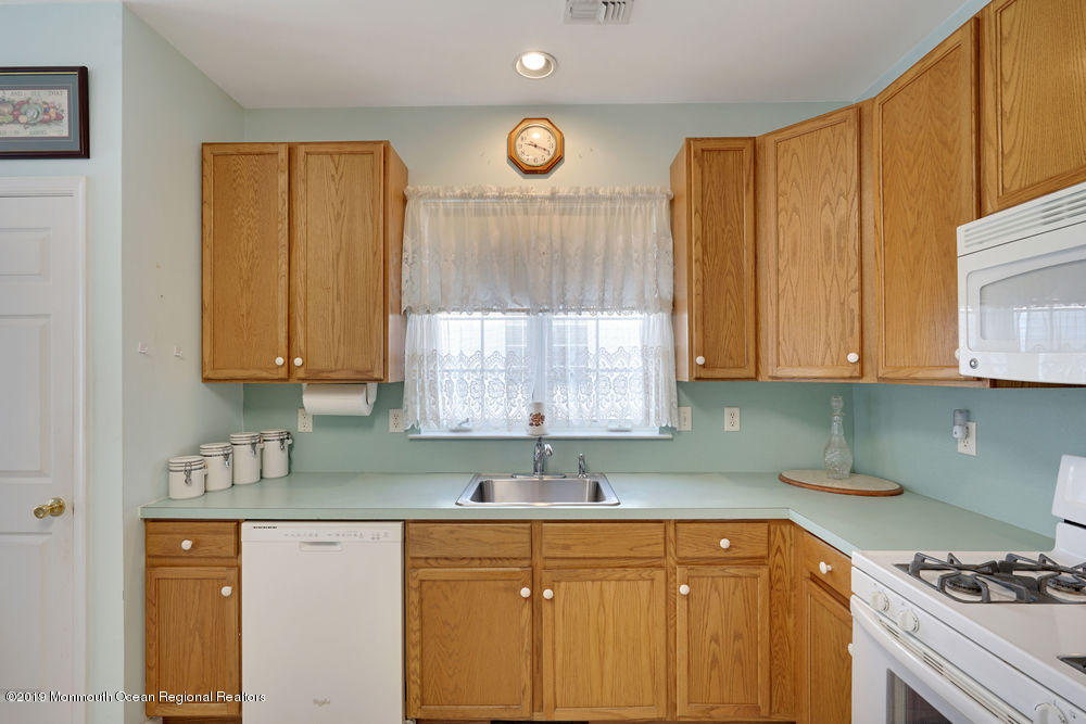 47 Wordsworth Road Brick, NJ 08724 - Photo 18 of 42 a kitchen with cabinets and window