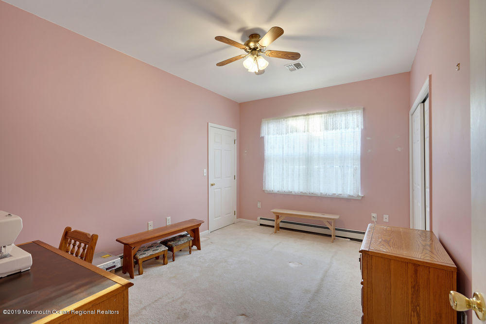 47 Wordsworth Road Brick, NJ 08724 - Photo 27 of 42 a living room with furniture and a window
