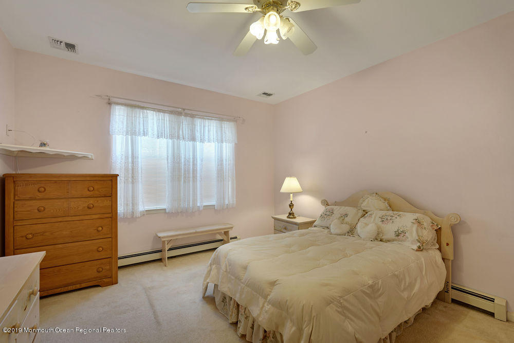 47 Wordsworth Road Brick, NJ 08724 - Photo 33 of 42 a bedroom with a bed and a dresser
