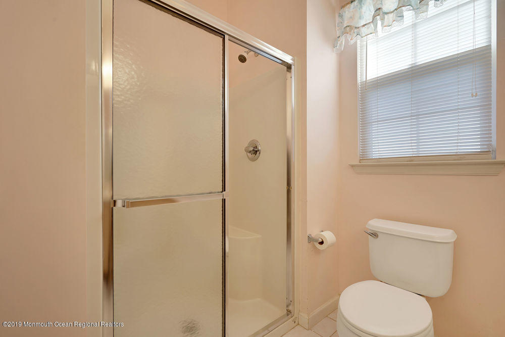 47 Wordsworth Road Brick, NJ 08724 - Photo 37 of 42 a white toilet sitting next to a bathroom sink
