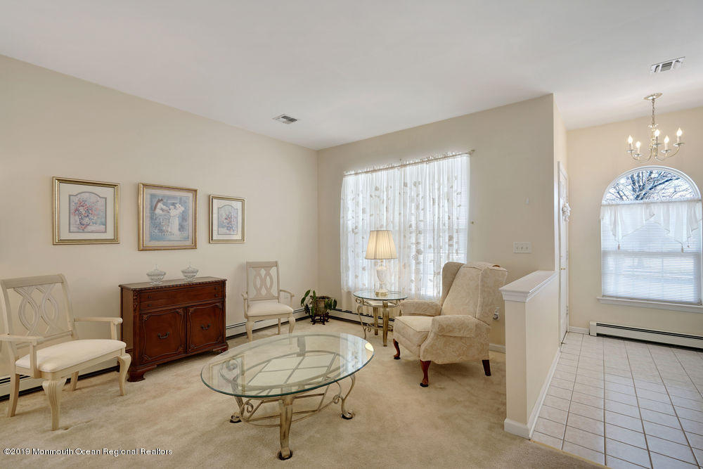 47 Wordsworth Road Brick, NJ 08724 - Photo 8 of 42 a living room with furniture and a window