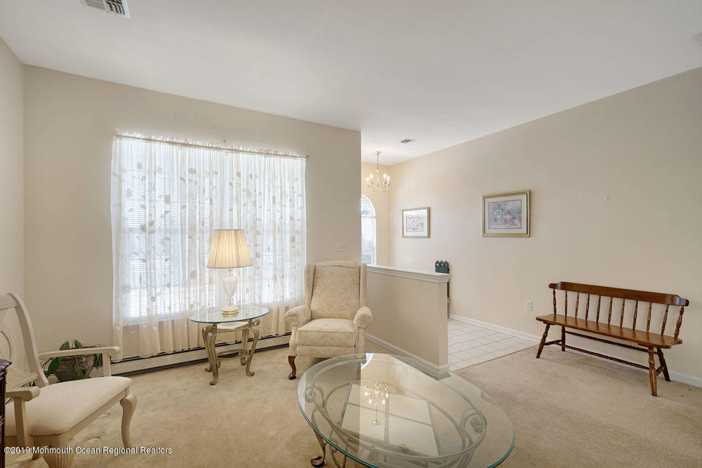 47 Wordsworth Road Brick, NJ 08724 - Photo 10 of 42 a living room with furniture and a window