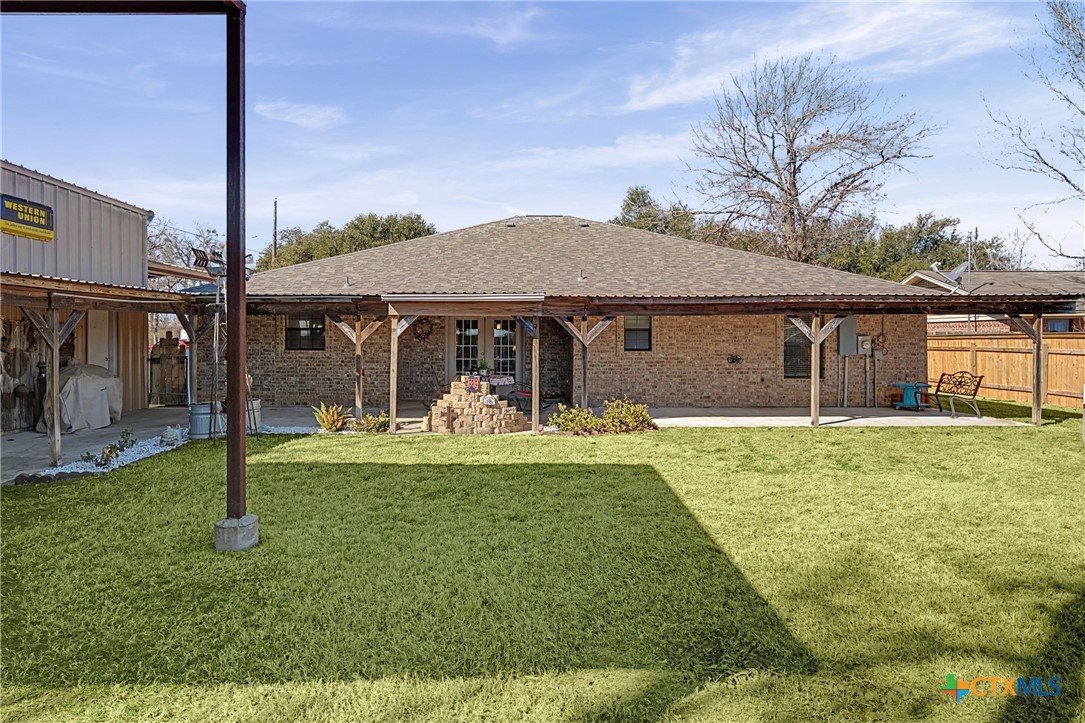 1601 Sunset Circle Cameron, TX 76520 - Photo 35 of 40 a front view of a house with a yard