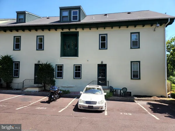 a car parked in front of a house