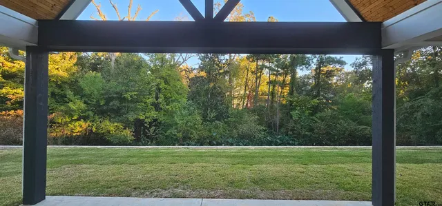 a view of a yard with a outdoor space