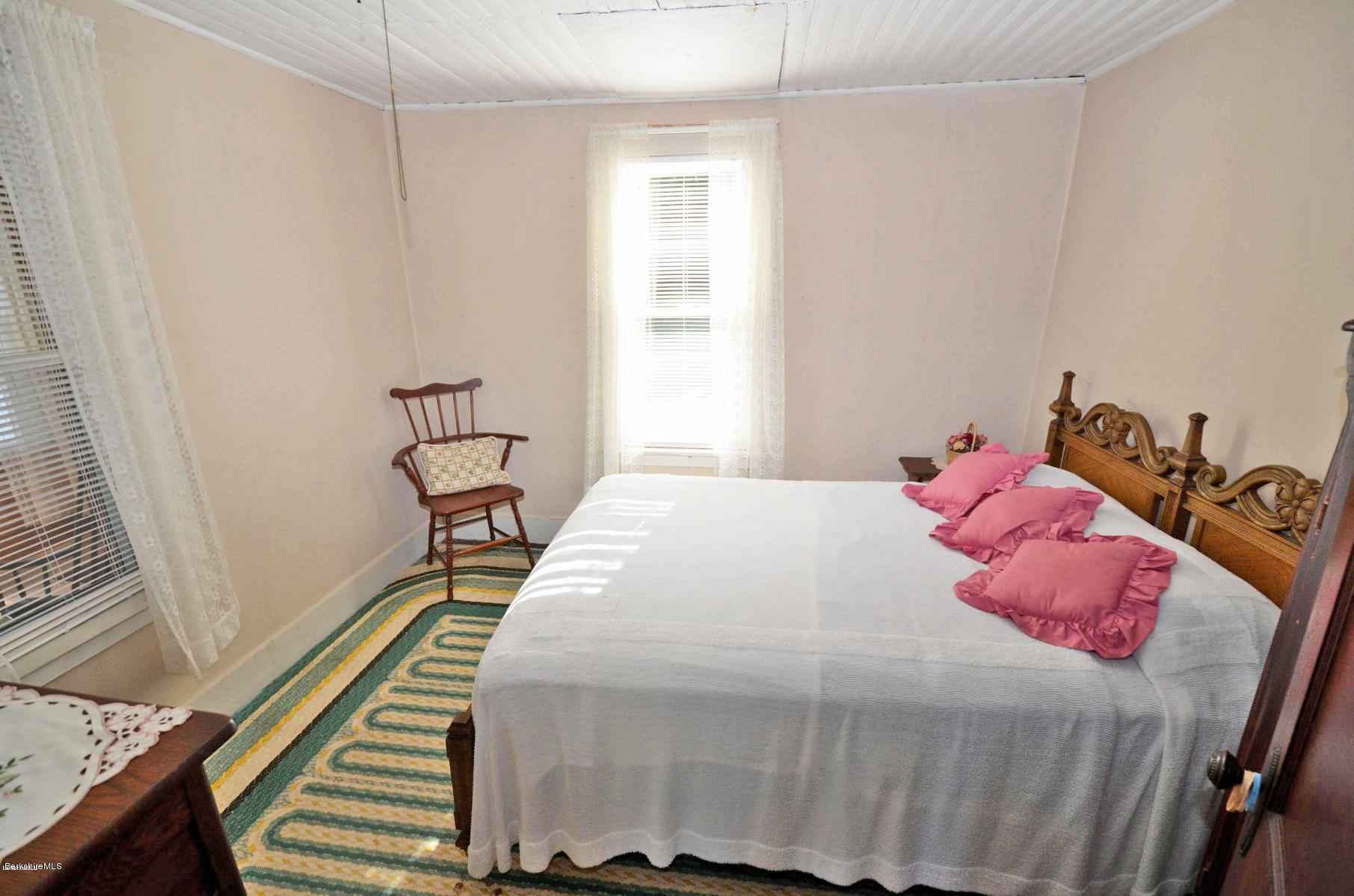59 Pine Grove Ridge Otis, MA 01029 - Photo 14 of 20 a bedroom with a bed and wooden floor