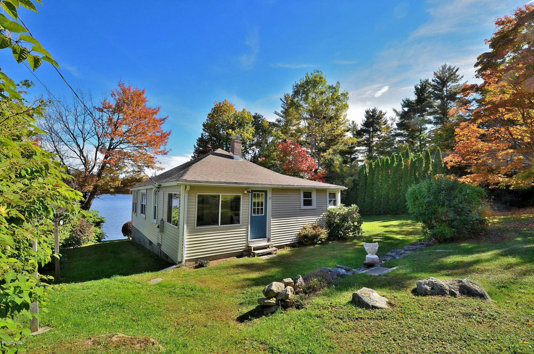 59 Pine Grove Ridge Otis, MA 01029 - Photo 4 of 20 a front view of a house with a yard