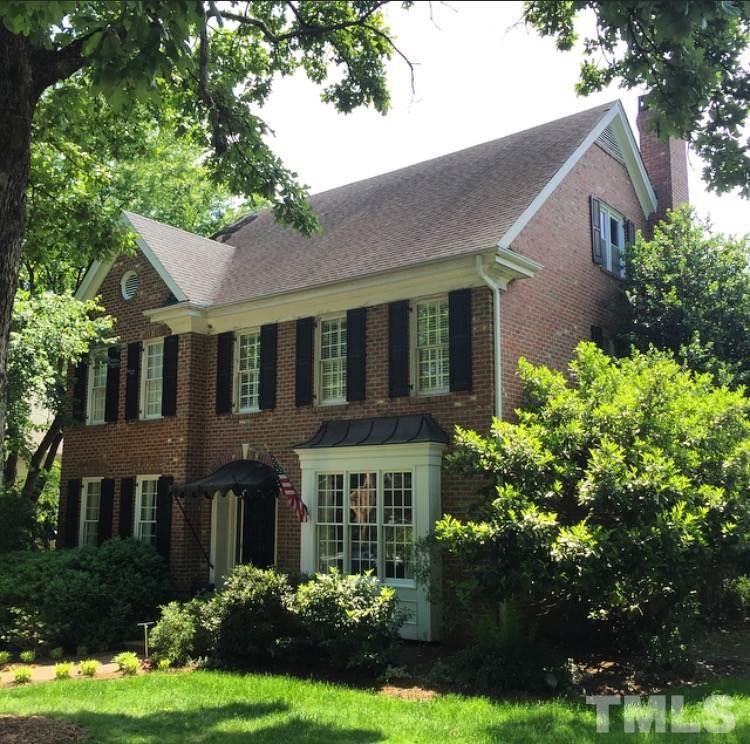 1712 Craig Street Raleigh, NC 27608 - Photo 1 of 25 a front view of a house with garden