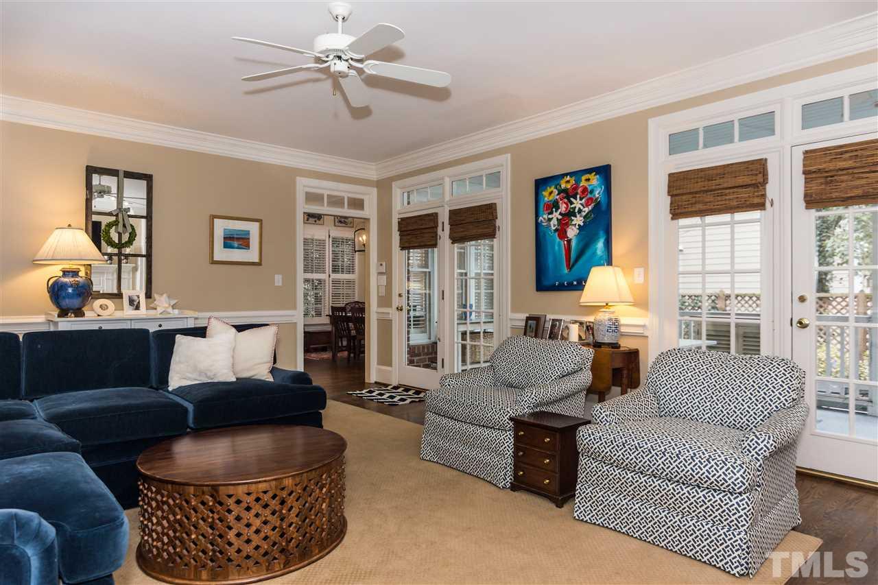 1712 Craig Street Raleigh, NC 27608 - Photo 12 of 25 a living room with furniture and a large window