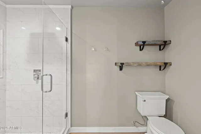 a bathroom with a bathtub and shower