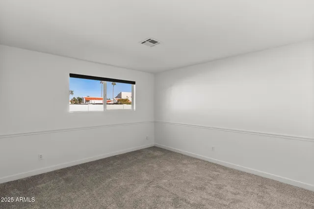 a view of a house with a garage