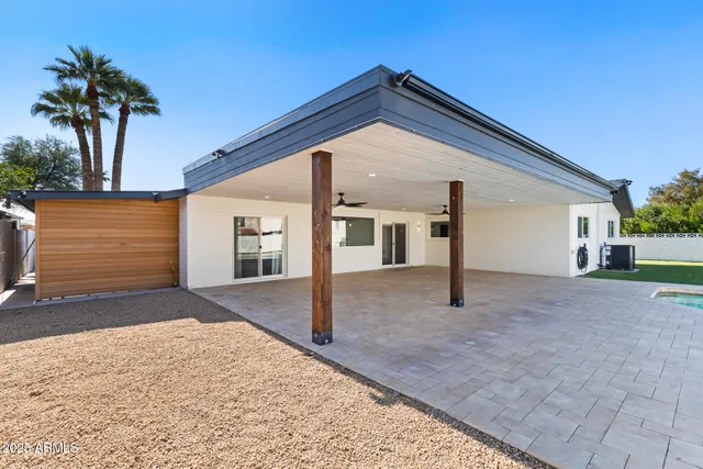 an aerial view of a house with a garden