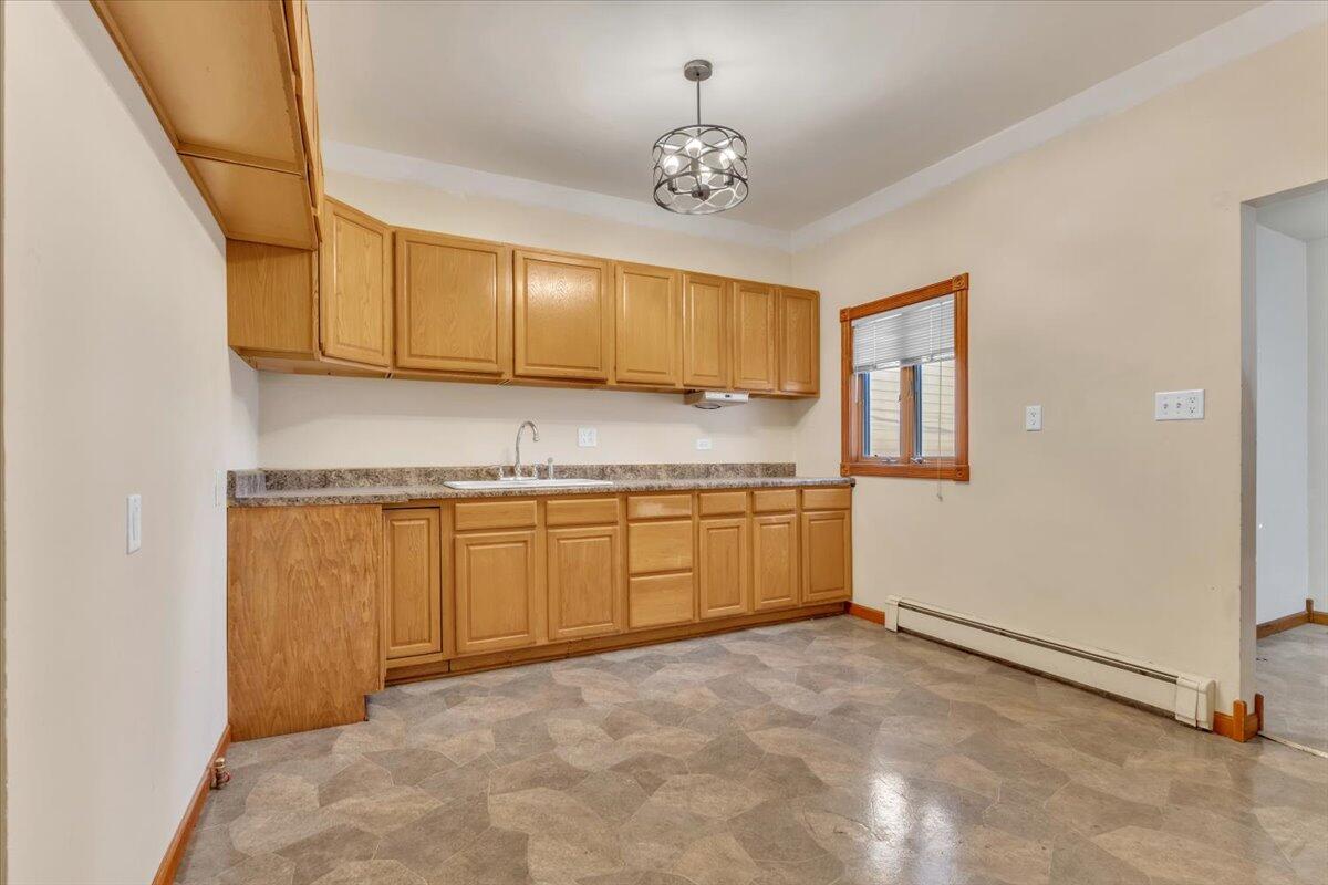 1536 West Fred Street Whiting, IN 46394 - Photo 3 of 18 a view of a kitchen with a sink and cabinets