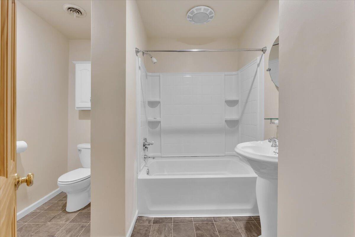 1536 West Fred Street Whiting, IN 46394 - Photo 10 of 18 a bathroom with a sink a toilet and shower