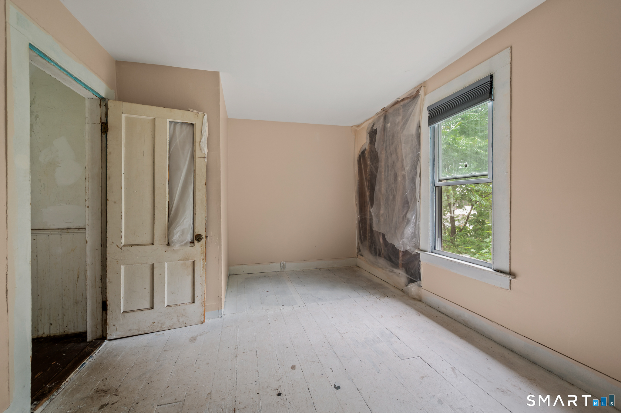 220 Murray Street Meriden, CT 06450 - Photo 14 of 28 an empty room with windows