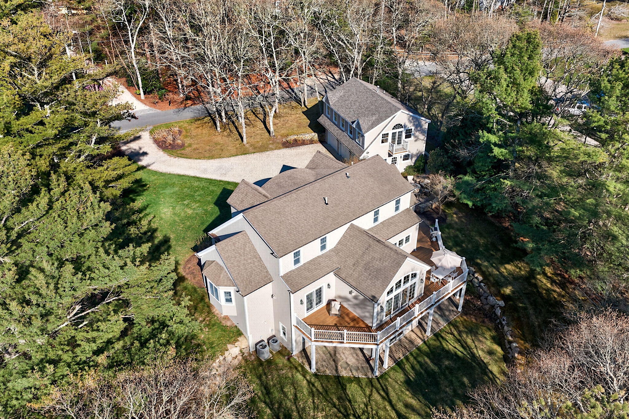 205 Little River Road Cotuit, MA 02635 - Photo 7 of 60 an aerial view of a house with outdoor space