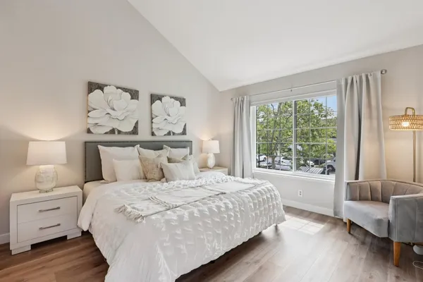 a bathroom with a sink vanity granite and a mirror