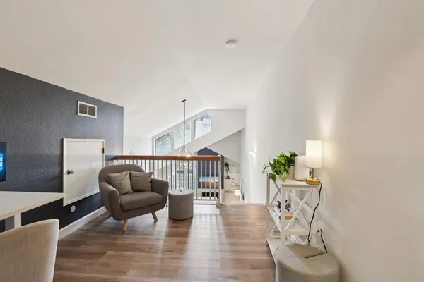 a house with a potted plant in front of it