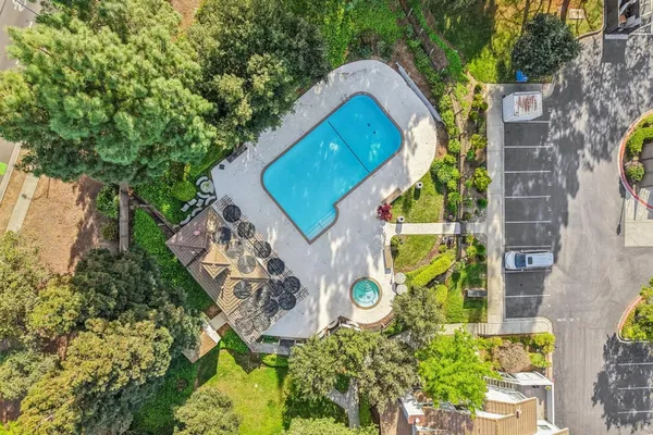 a outdoor living space with furniture and potted plants