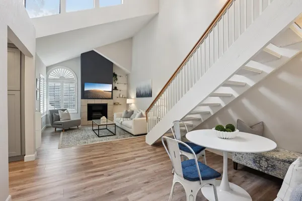 a living room with furniture and a table