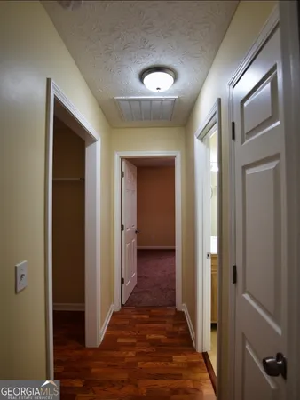 a bathroom with a toilet and sink