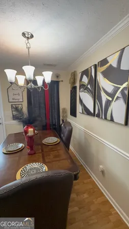 a kitchen with stainless steel appliances granite countertop a sink dishwasher stove and cabinets