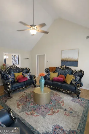 a bed room with furniture and a window