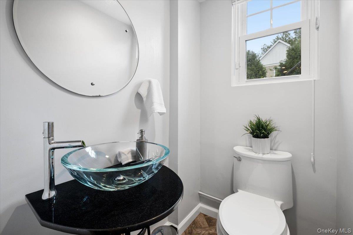 30 Stonehouse Road Scarsdale, NY 10583 - Photo 20 of 24 Powder room on lower level.