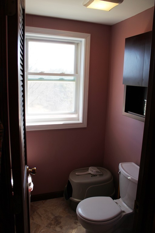 206 East Colrain Road Colrain, MA 01340 - Photo 13 of 27 a white toilet sitting next to a window