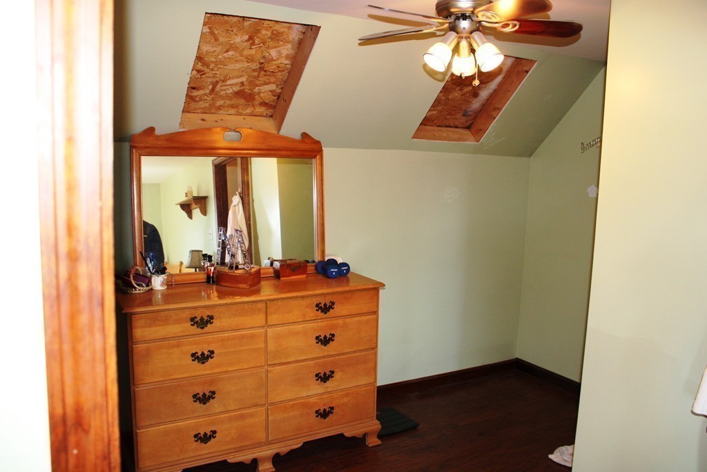 206 East Colrain Road Colrain, MA 01340 - Photo 20 of 27 a view of a chandelier fan and wooden floor