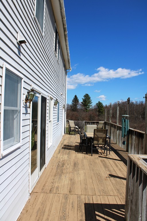 206 East Colrain Road Colrain, MA 01340 - Photo 2 of 27 a view of a terrace with chairs