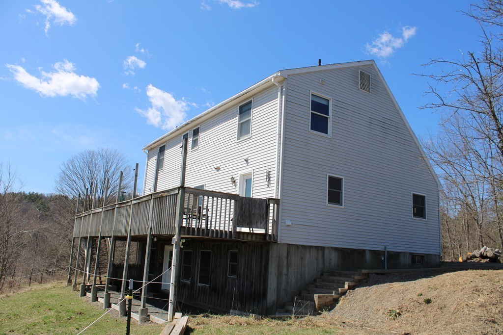 206 East Colrain Road Colrain, MA 01340 - Photo 3 of 27 a front view of a house with street