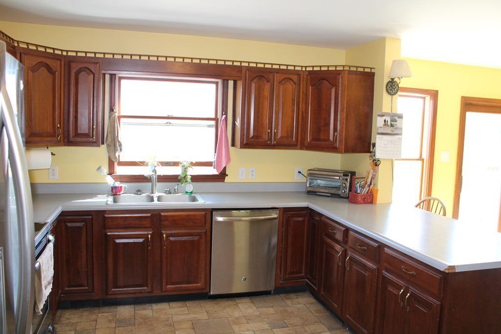 206 East Colrain Road Colrain, MA 01340 - Photo 5 of 27 a kitchen with stainless steel appliances granite countertop a sink window and cabinets