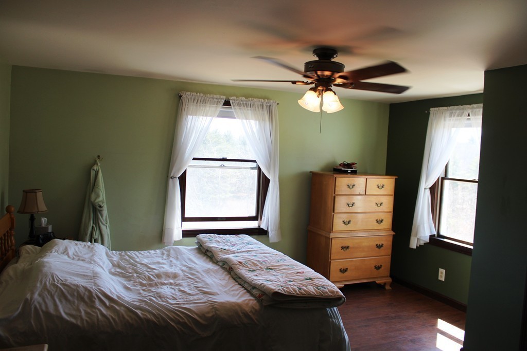 206 East Colrain Road Colrain, MA 01340 - Photo 9 of 27 a bedroom with a bed and a window