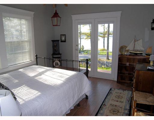 318 Eddy Road, Unit 418 Edgecomb, ME 04556 - Photo 5 of 17 Master Bedroom.
