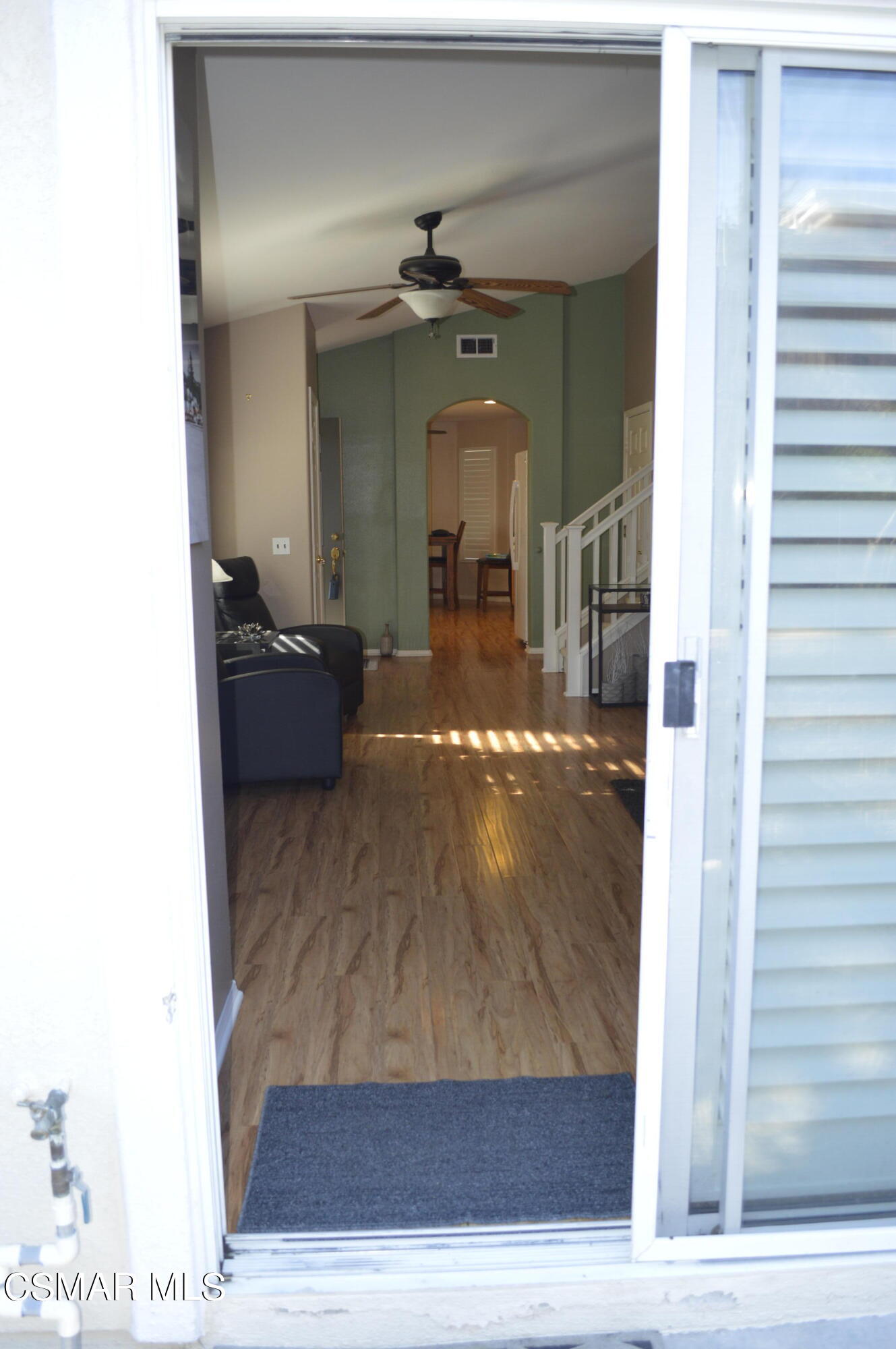 2040 Freesia Avenue Simi Valley, CA 93063 - Photo 13 of 23 a view of a hallway with a chandelier