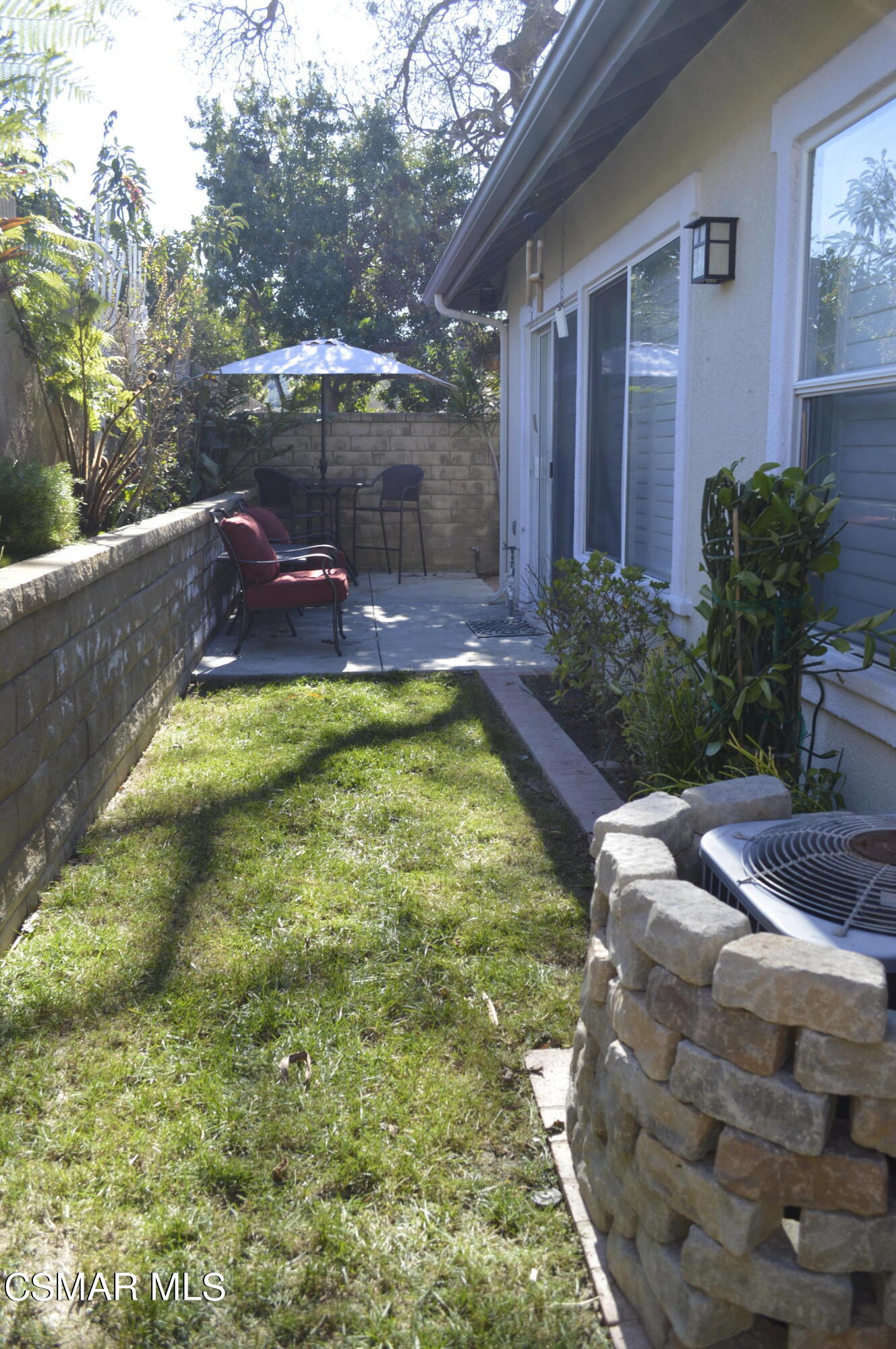2040 Freesia Avenue Simi Valley, CA 93063 - Photo 16 of 23 a view of a backyard with swimming pool