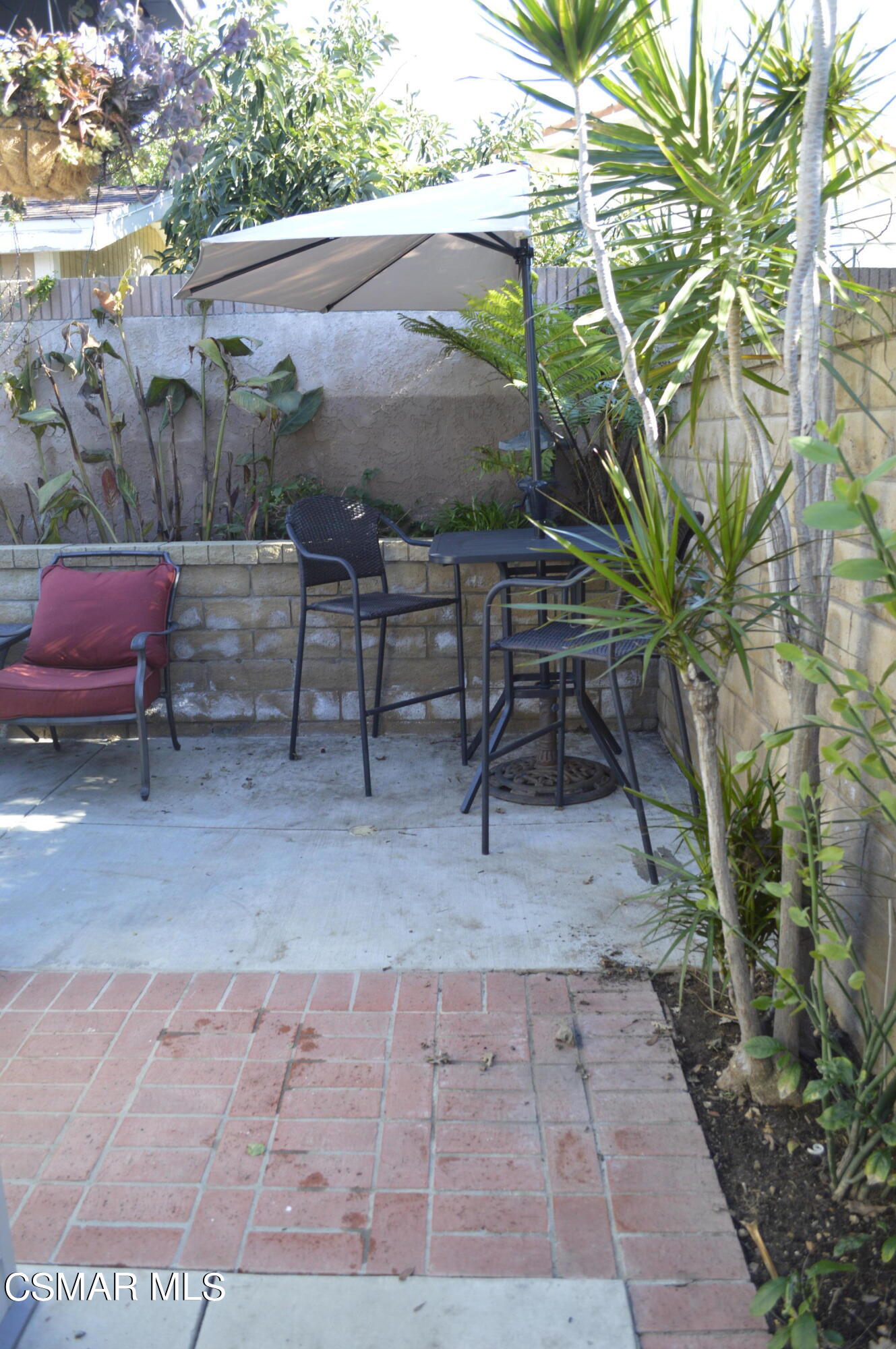 2040 Freesia Avenue Simi Valley, CA 93063 - Photo 18 of 23 a view of a backyard with sitting area