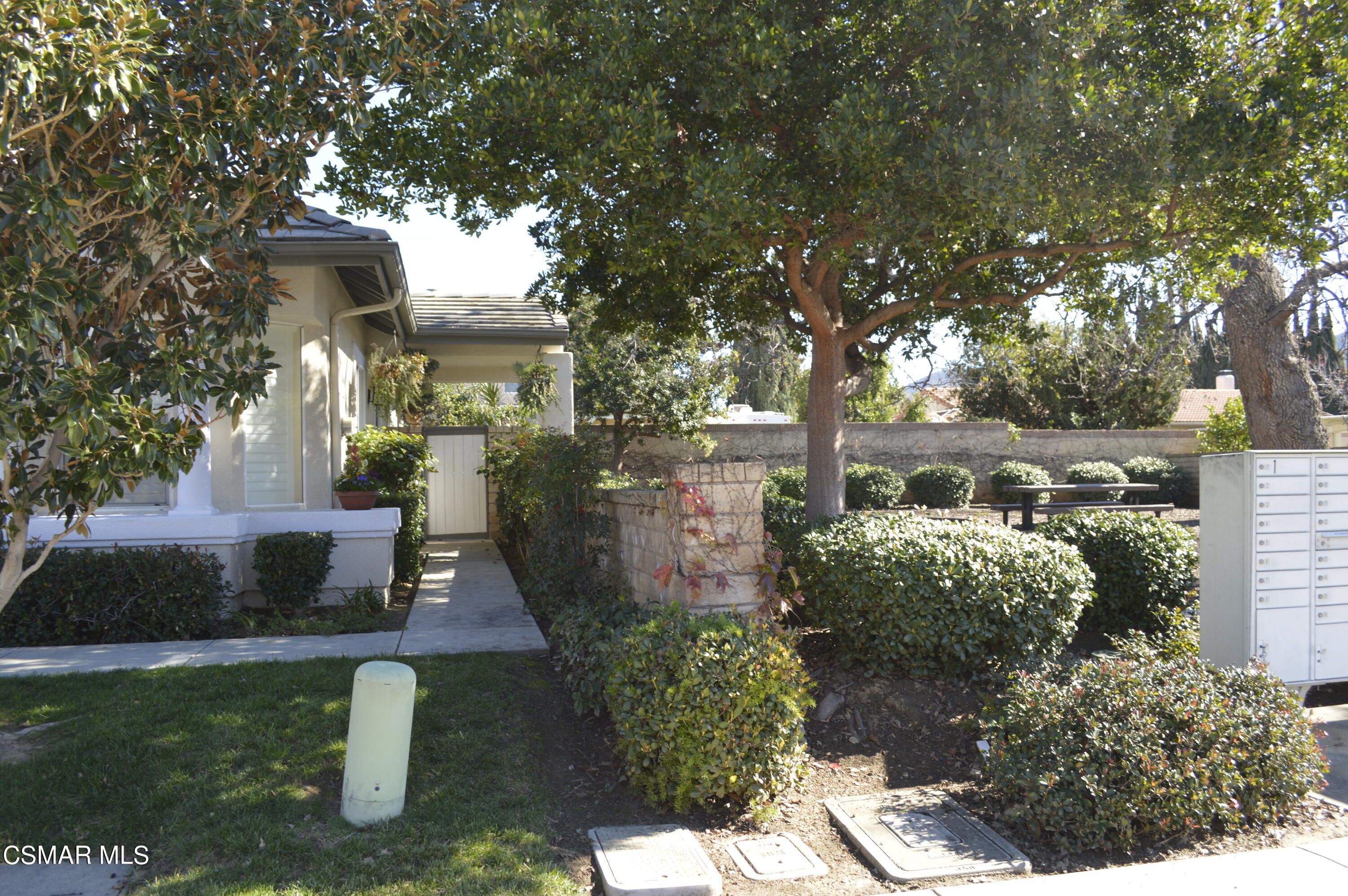 2040 Freesia Avenue Simi Valley, CA 93063 - Photo 20 of 23 a front view of a house with garden