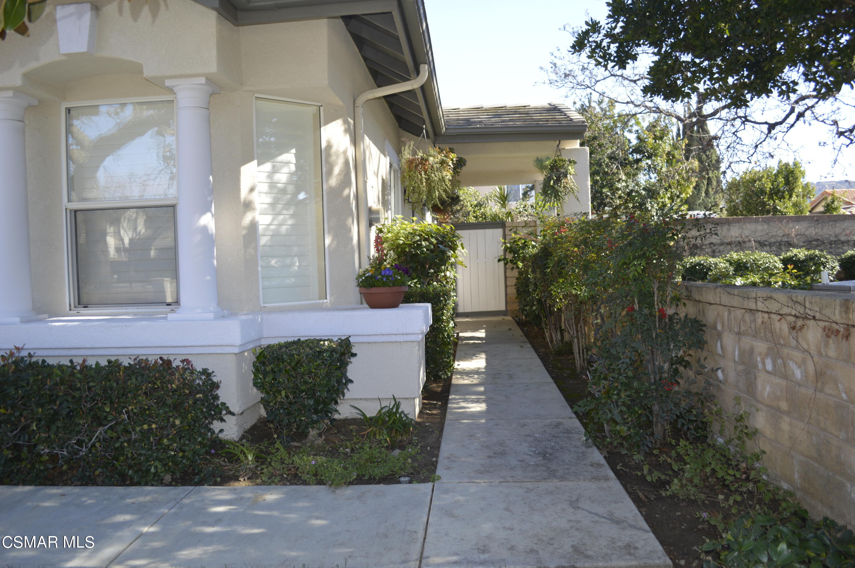 2040 Freesia Avenue Simi Valley, CA 93063 - Photo 2 of 23 a view of a house with a yard