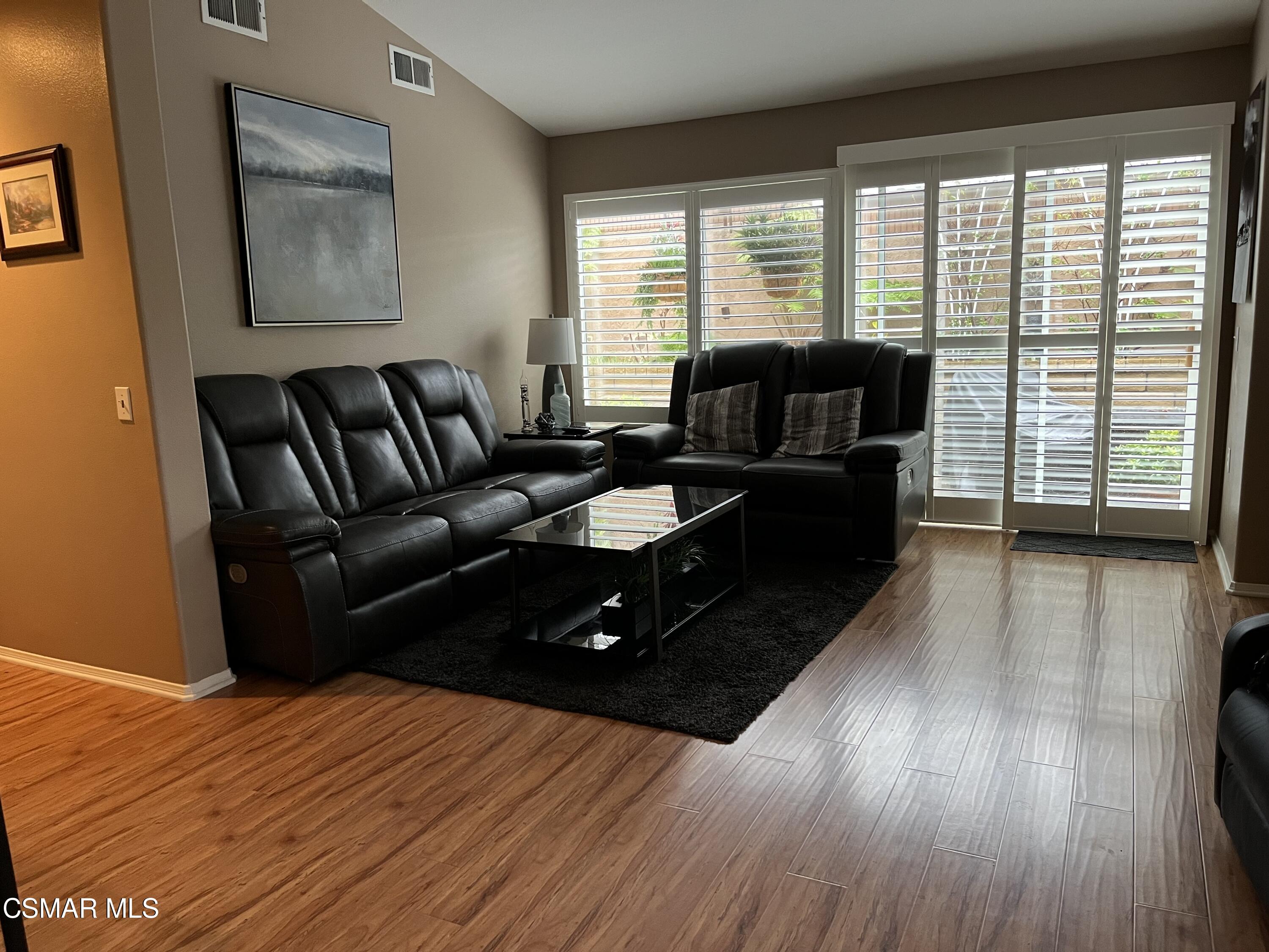 2040 Freesia Avenue Simi Valley, CA 93063 - Photo 6 of 23 a living room with furniture and wooden floor
