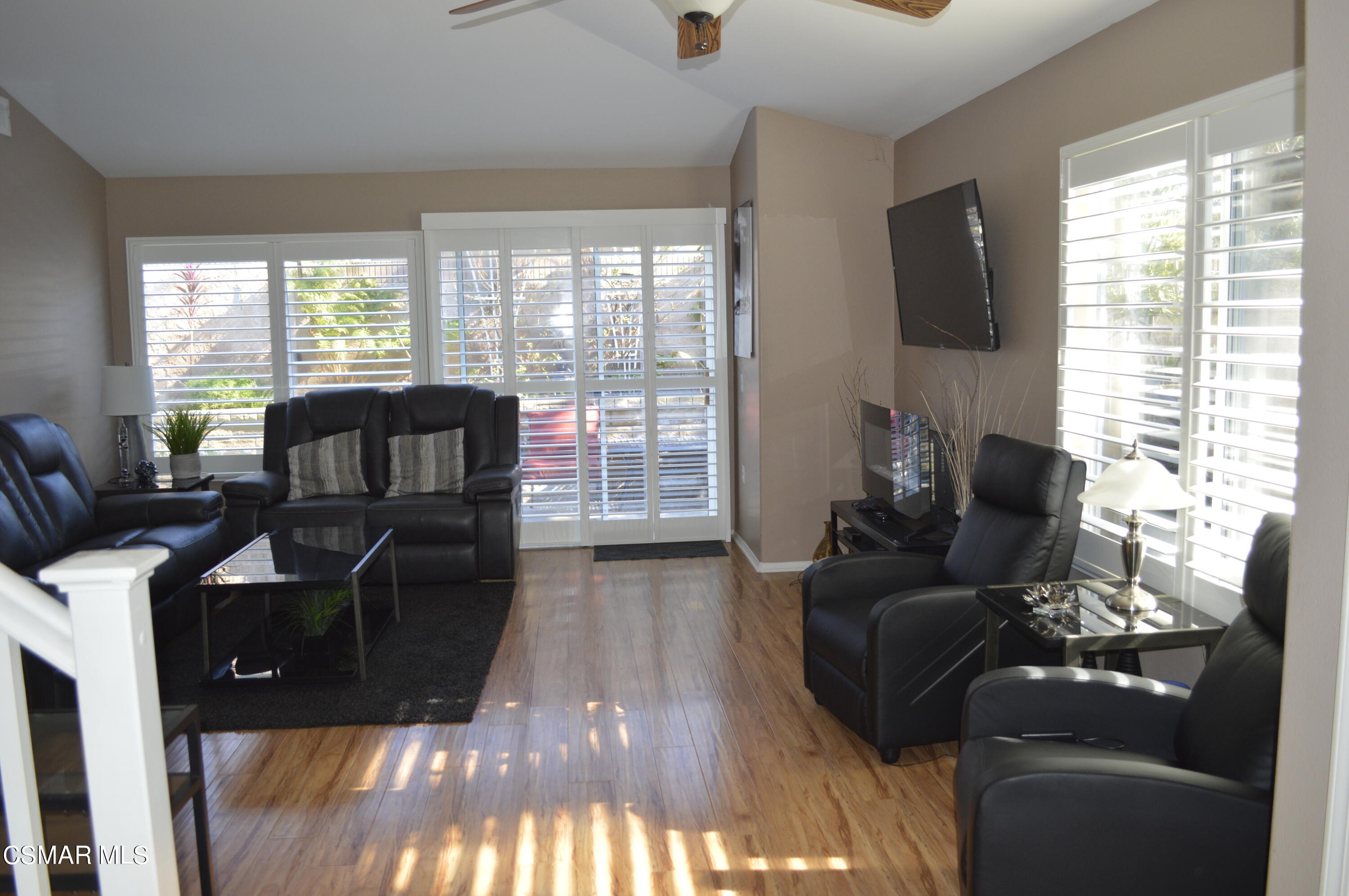 2040 Freesia Avenue Simi Valley, CA 93063 - Photo 7 of 23 a living room with furniture and a flat screen tv