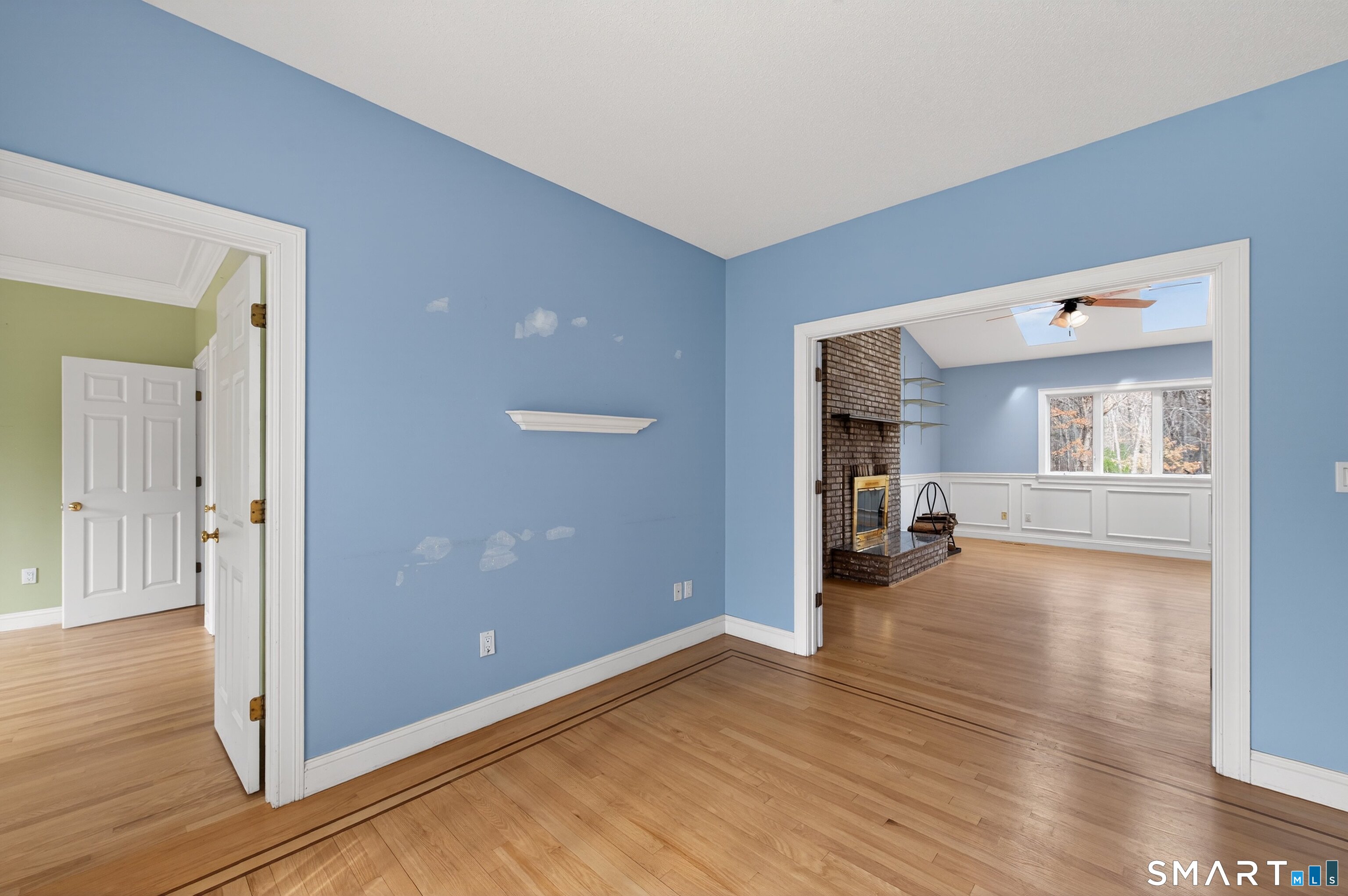 724 Strong Road South Windsor, CT 06074 - Photo 5 of 39 a view of a livingroom with wooden floor