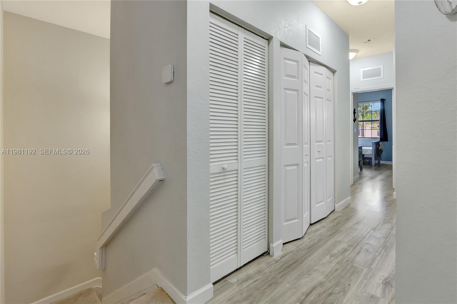 338 Northeast 37th Avenue Homestead, FL 33033 - Photo 9 of 19 a view of a hallway with wooden floor and entryway