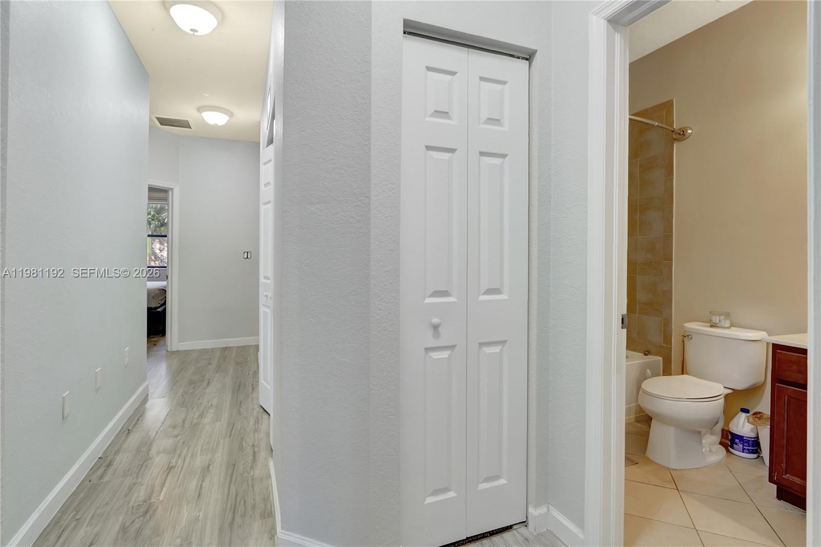 338 Northeast 37th Avenue Homestead, FL 33033 - Photo 10 of 19 a bathroom with a sink and a toilet