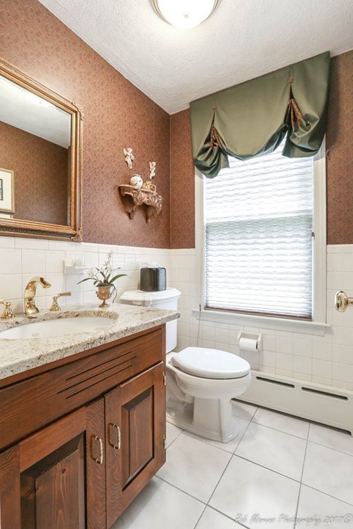 19 Bare Hill Road Boxford, MA 01921 - Photo 13 of 30 a bathroom with a granite countertop sink a toilet and a mirror