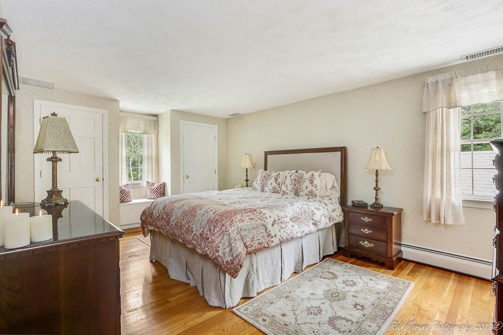 19 Bare Hill Road Boxford, MA 01921 - Photo 14 of 30 a bedroom with a bed and wooden floor