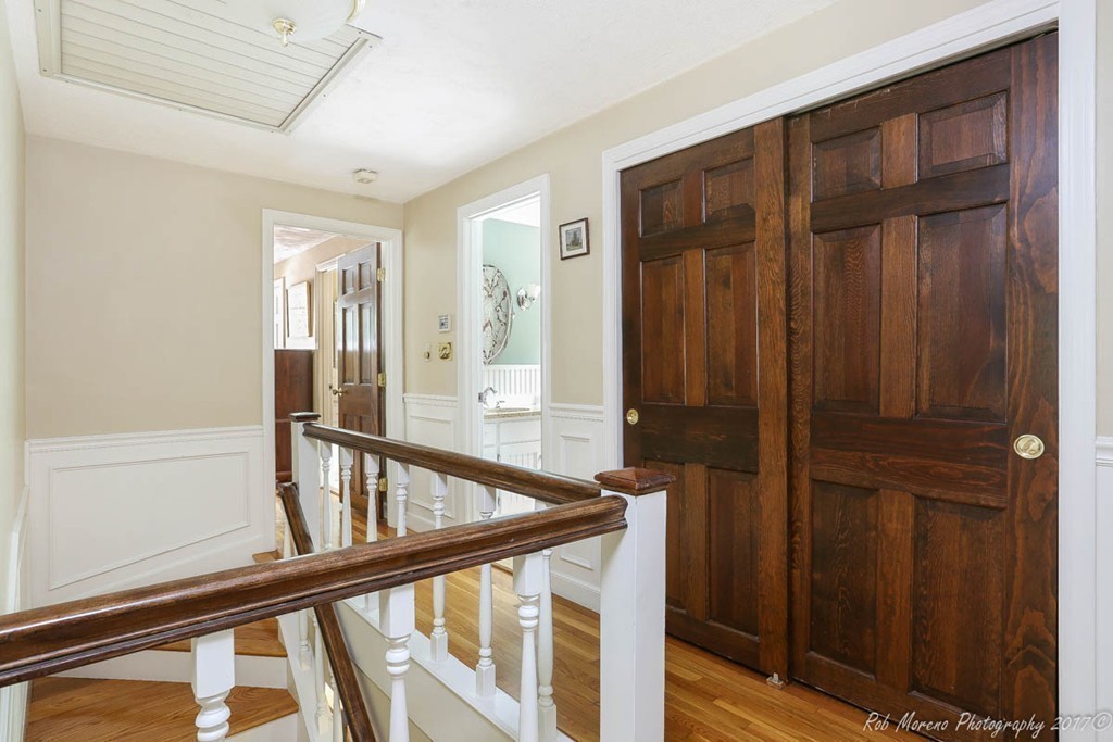19 Bare Hill Road Boxford, MA 01921 - Photo 20 of 30 a view of a hallway with wooden floor and staircase
